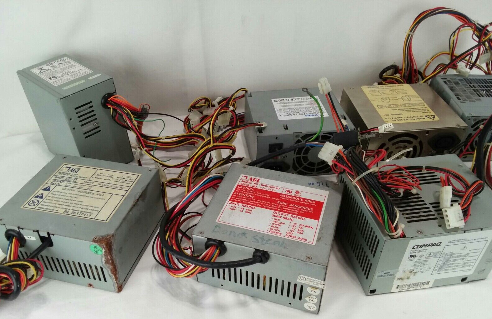 LOT OF 8 – Different Assorted Computer Power Supply Units w/ Wiring – untested