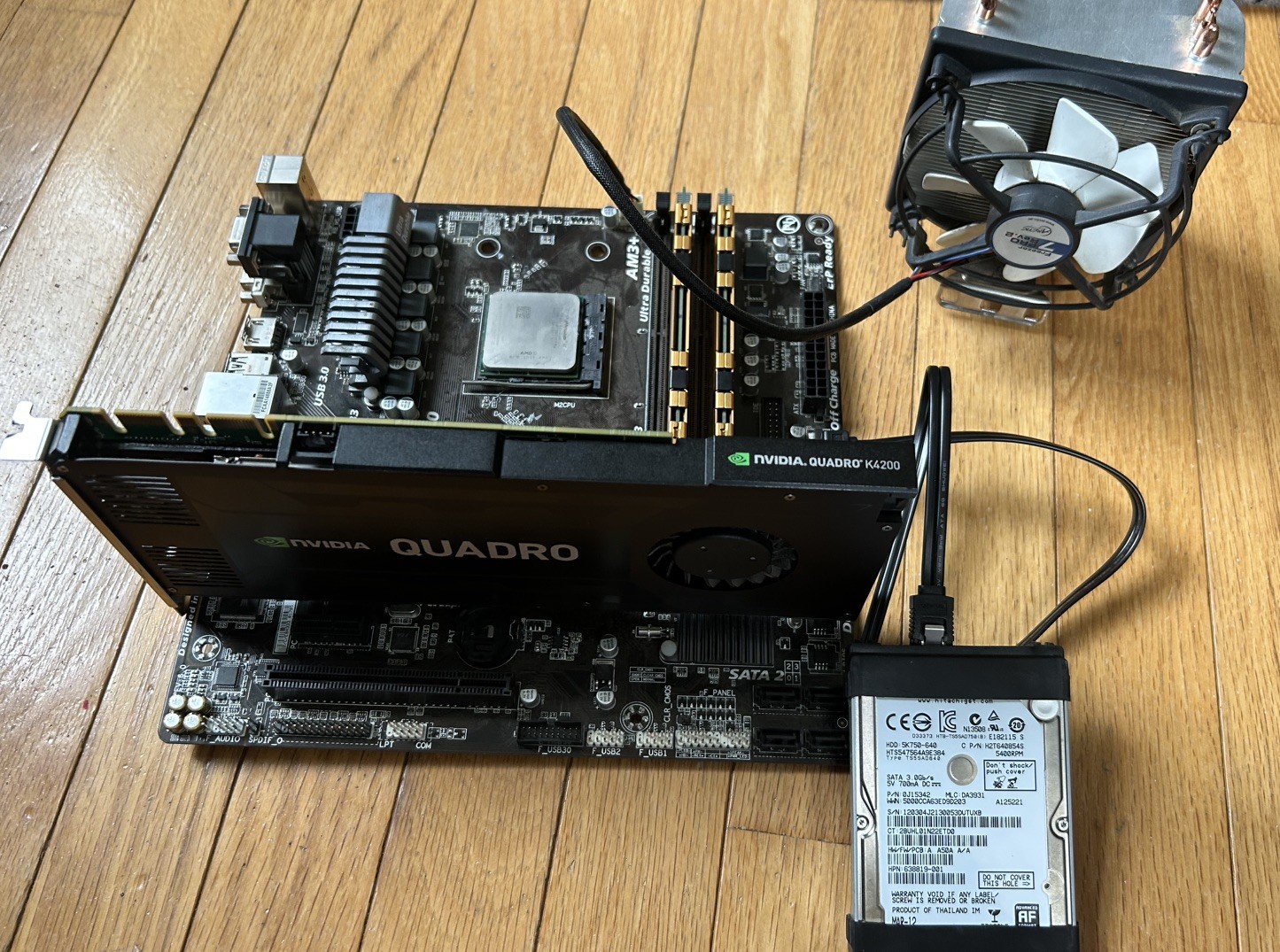 Motherboard bundle with CPU, RAM, GPU, HDD, and cooler