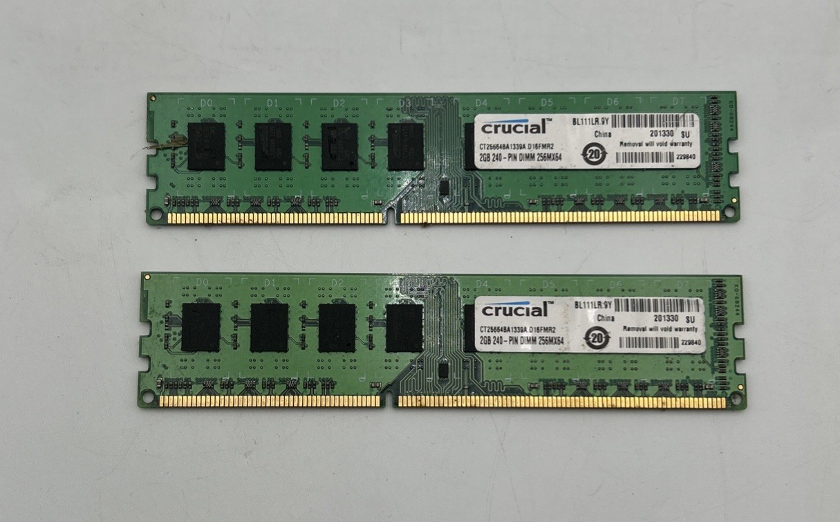 Two Crucial 2GB 240-Pin DIMM 256Mx64 DDR3 Desktop Memory. CT25664BA1339A.D16FRM2