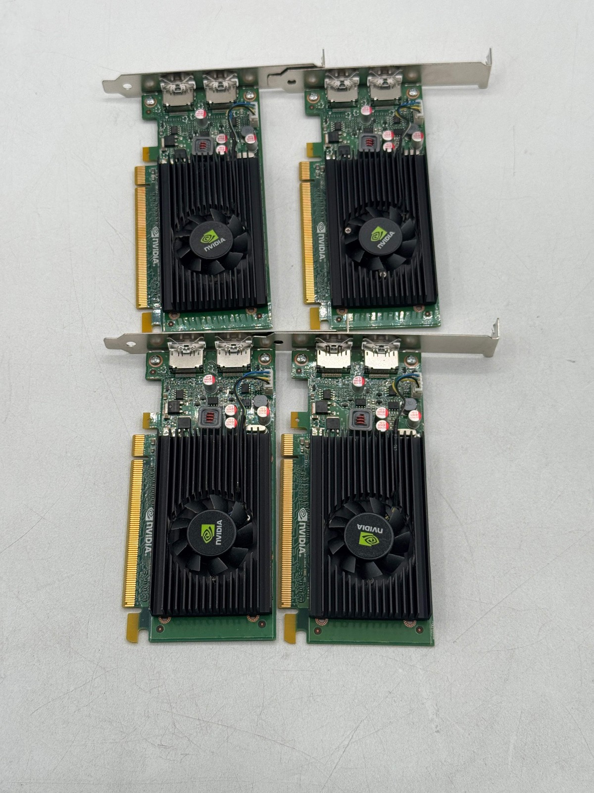 Lot of 4 NVIDIA NVS 310 1GB DDR3 PCI Express x16 Video Cards, 2x DisplayPort