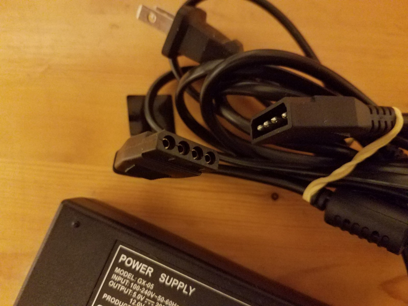 POWER SUPPLY GX-05 AC Adapter 100-240V Output 12.0V 2.0A SATA or Molex 4-Pin
