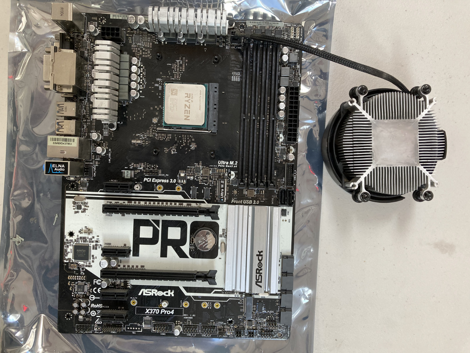 ASRock X370 Pro4 ATX motherboard, AMD Ryzen 5 2400G with cooler, used