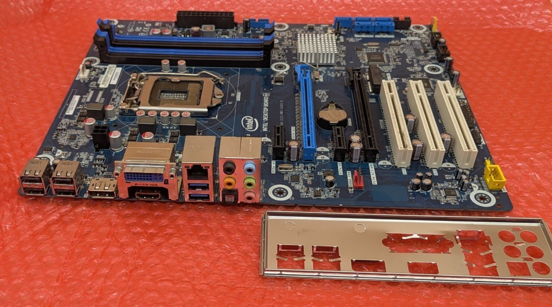 Intel DH87MC H87 Desktop Motherboard LGA 1150 ATX DDR3 with I/O Shield ~ G74242-